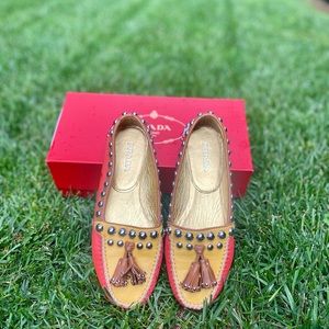 Prada Leather Studded Slip On with tassels
